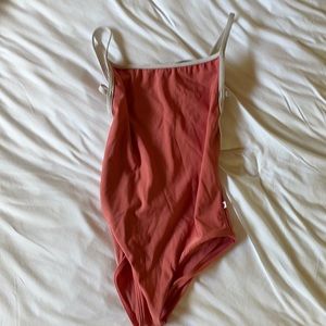 Salmon colored YUMIKO leotard